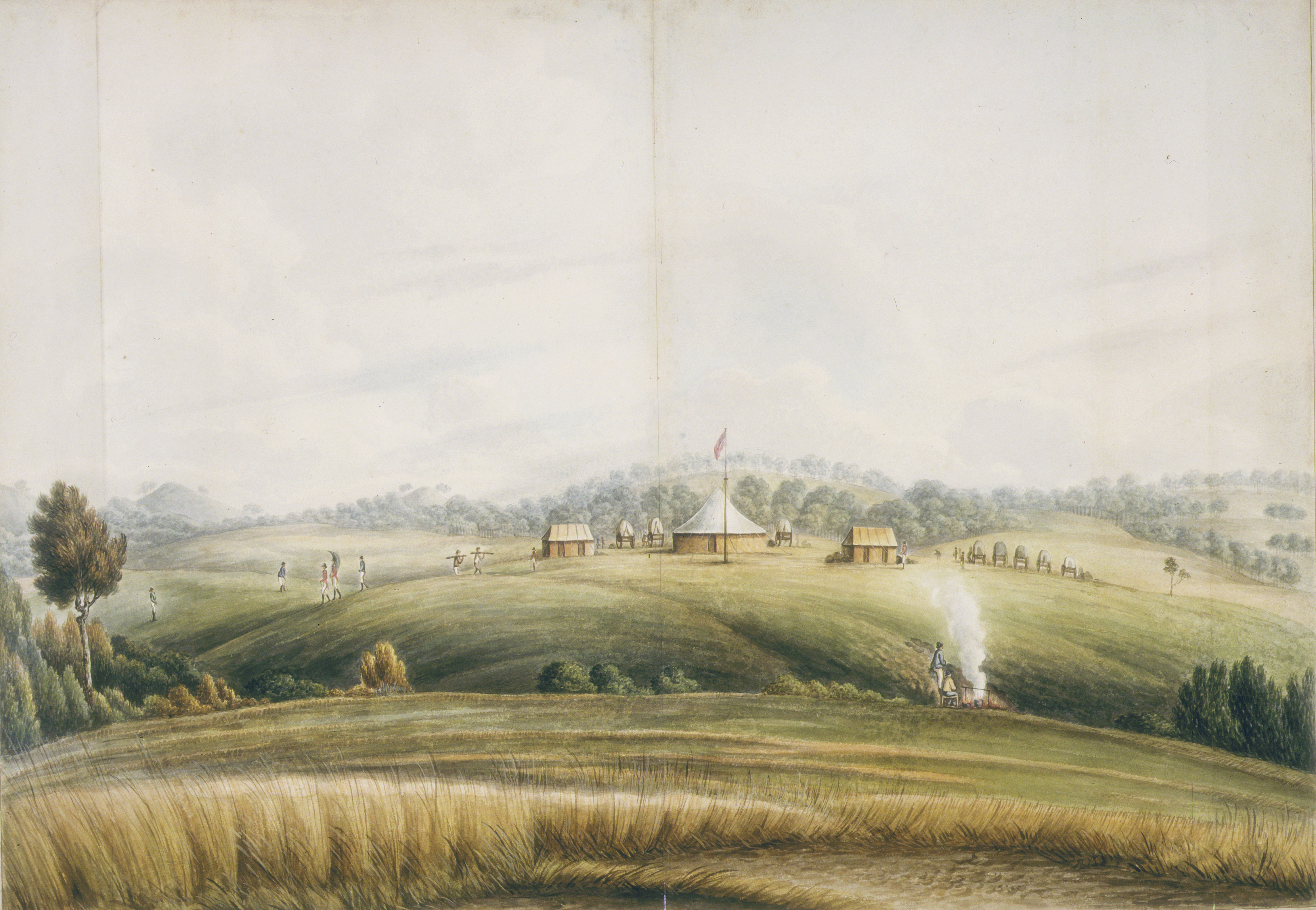 A painting of a landscape with early colonial structures on top of a grassy hill surrounded by pastural land. Soldiers and workers can be seen moving amongst the building and parked buggies while two men tend a fire in the foreground pasture. 