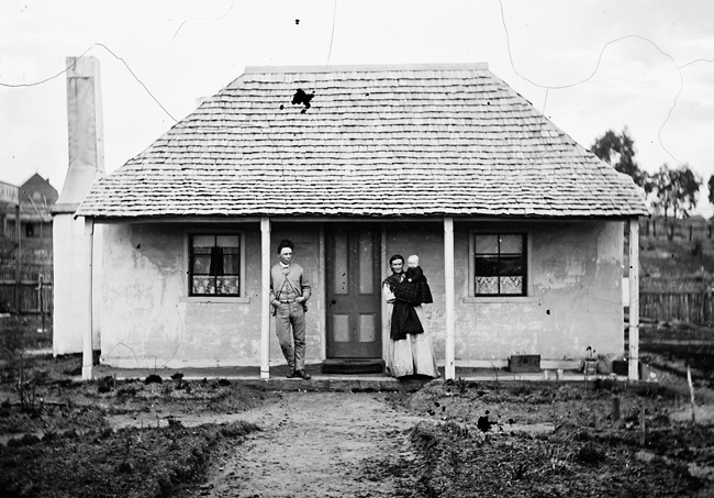  Mark Hammond with his wife Mary outside their four room cottage in Tambaroora St., Hill End, 1872