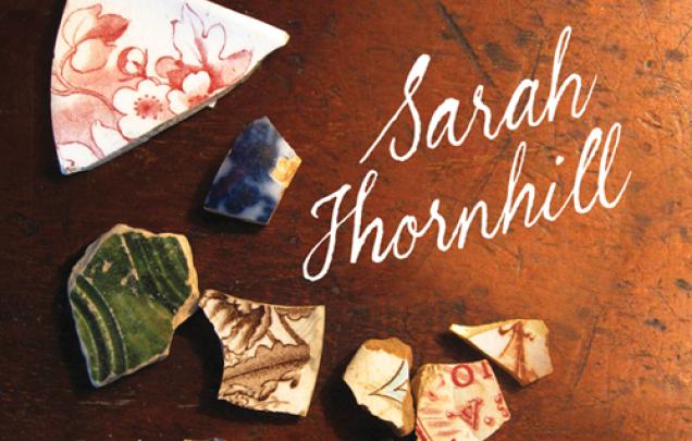 Fragments of pottery on book cover of Sarah Thornhill by Kate Grenville