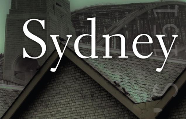 Old brick house with the top of the Sydney Harbour bridge behind it on cover of Sydney by Delia Falconer
