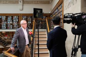 Dr John Vallance being interviewed about the Library reopening after COVID shutdown in 2021