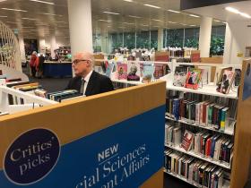 Dr John Vallance browsing the shelves of Critics Pick