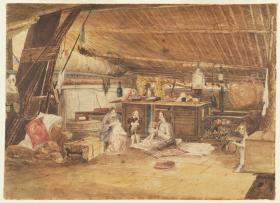 Two women and some children sitting on the floor of a wooden room