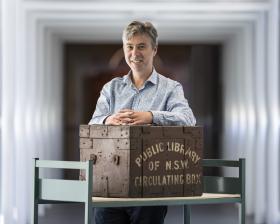 Cameron Morley with the Public Library of NSW Circulating Box