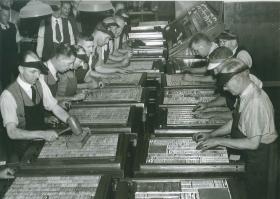 Sydney Morning Herald typesetters  preparing the paper with news appearing on the front page for the first time. 1944