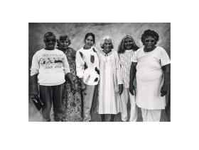 A group of women posing for the camera