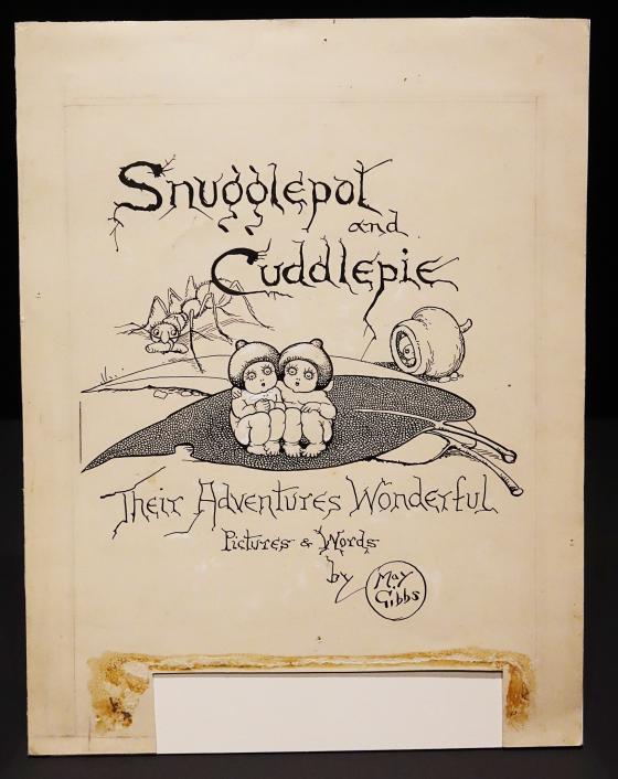 Drawing of title page for Snugglepot and Cuddlepie featuring an image of two miniature babies with gumnut hats sitting on a gum leaf.