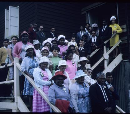 Group on the steps of the AIM Church, Cherbourg (Call number: MLMSS 9638/Folder 17/3, 67)