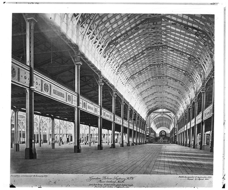 Empty interior of Garden Palace Sydney showing wooden beams and pillars