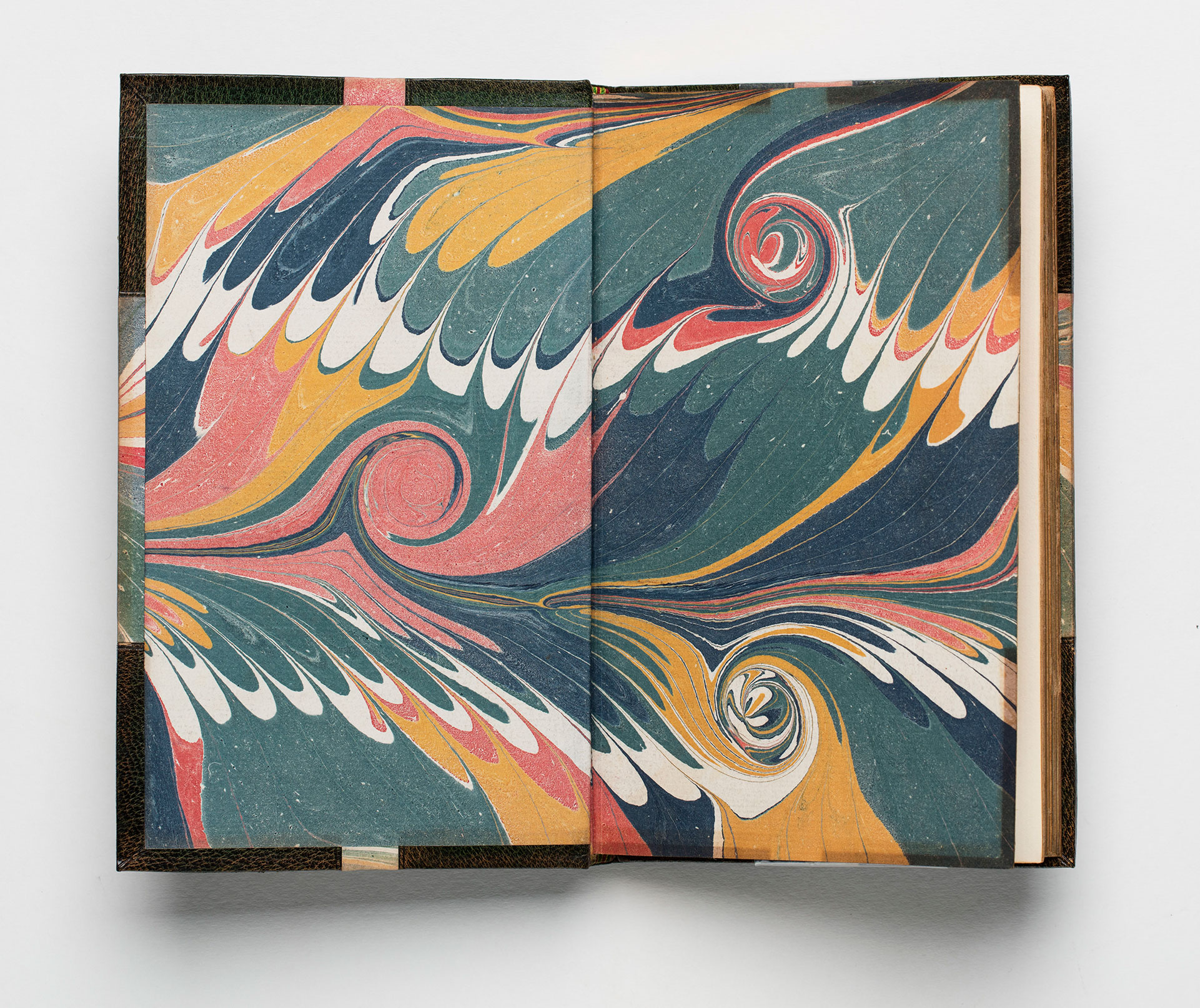 Endpaper with a colourful marbled pattern.
