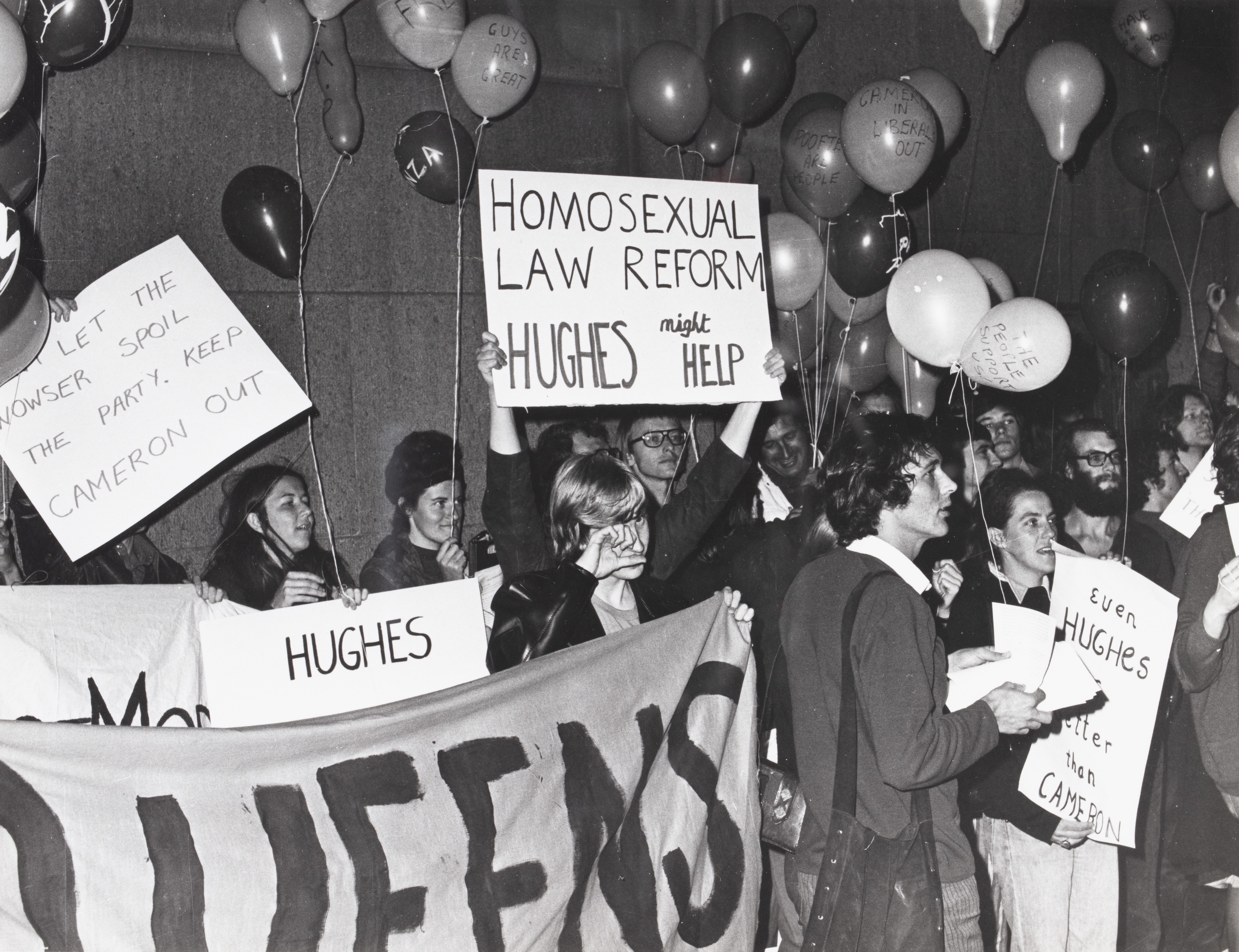 Banner: ‘Queens’ & placard: ‘Homosexual Law reform’, CAMP Inc. demonstration outside NSW Liberal Party Headquarters, Ash St, Sydney.