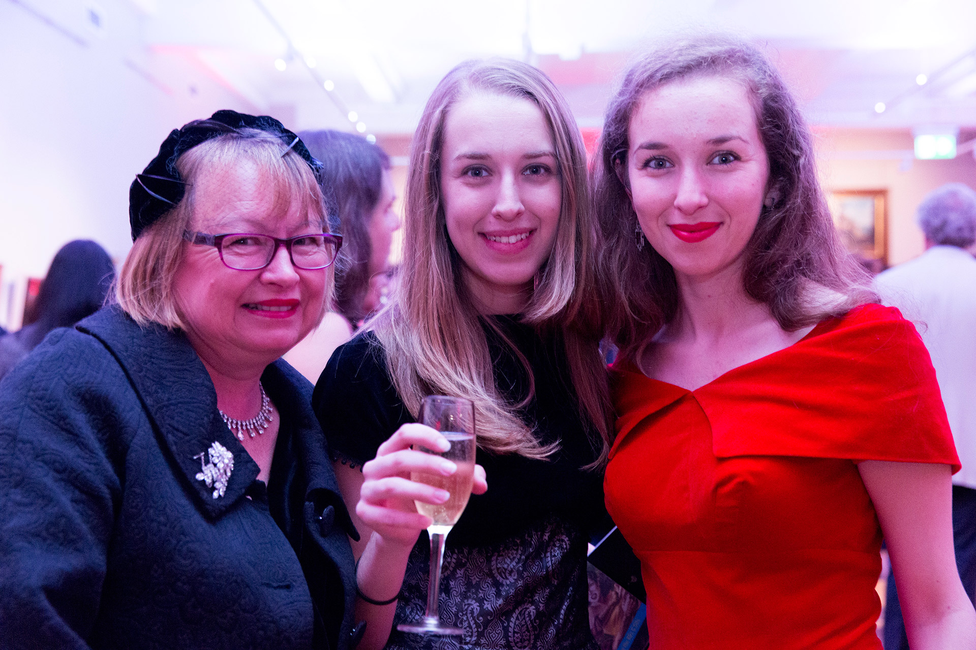 Three women at an event 