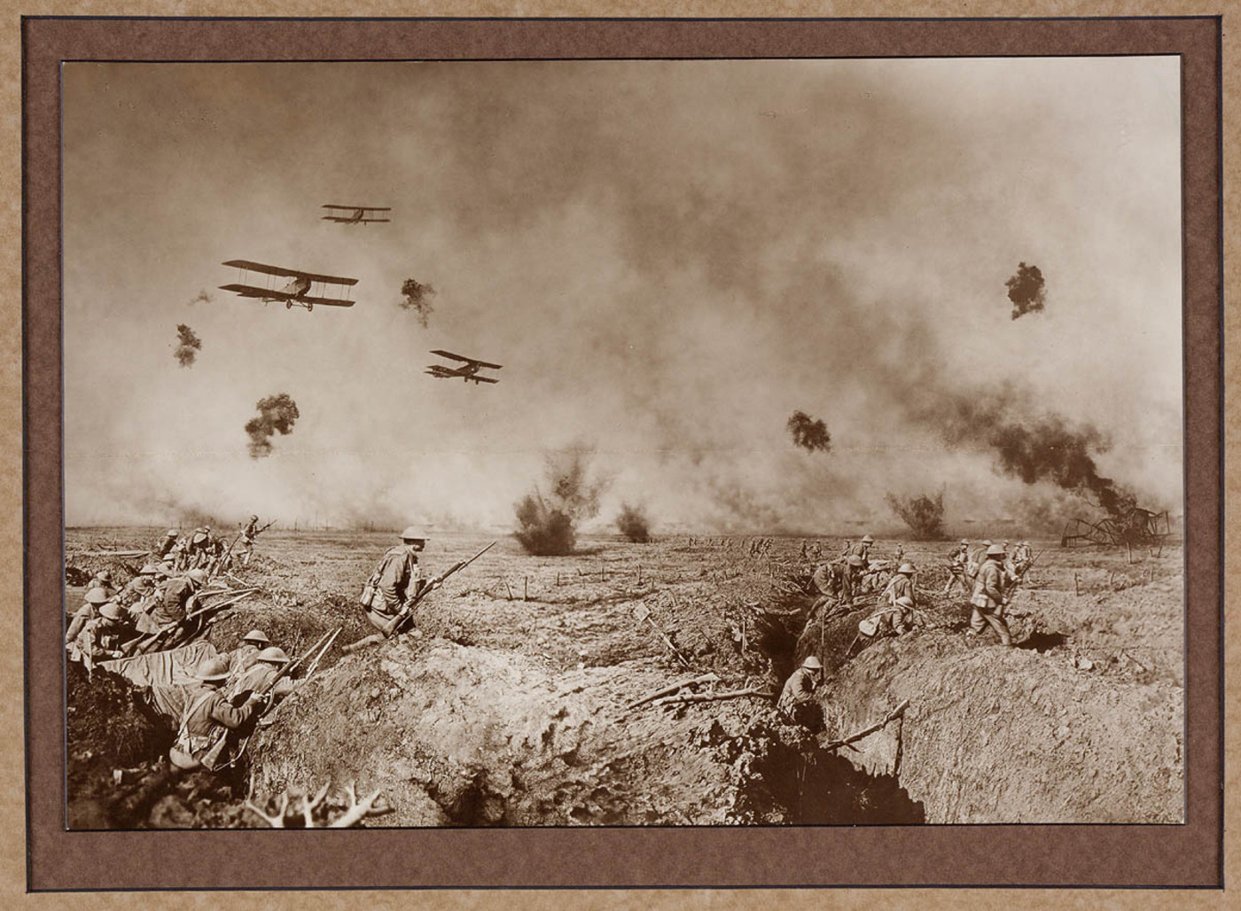 An episode after the Battle of Zonnebeke. Australian Infantry moving forward to resist a counter attack. On the-extreme right a machine brought down in flames is burning fiercely. Our advance is supported by bombing planes...