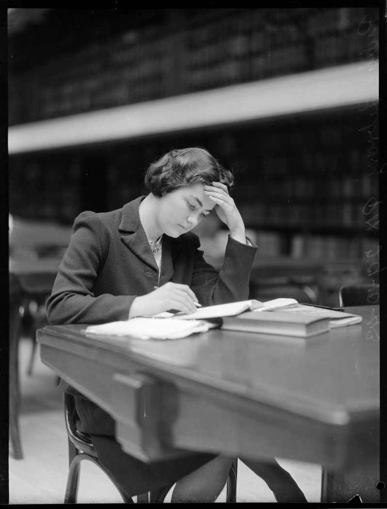 Woman sitting at desk in Reading Room