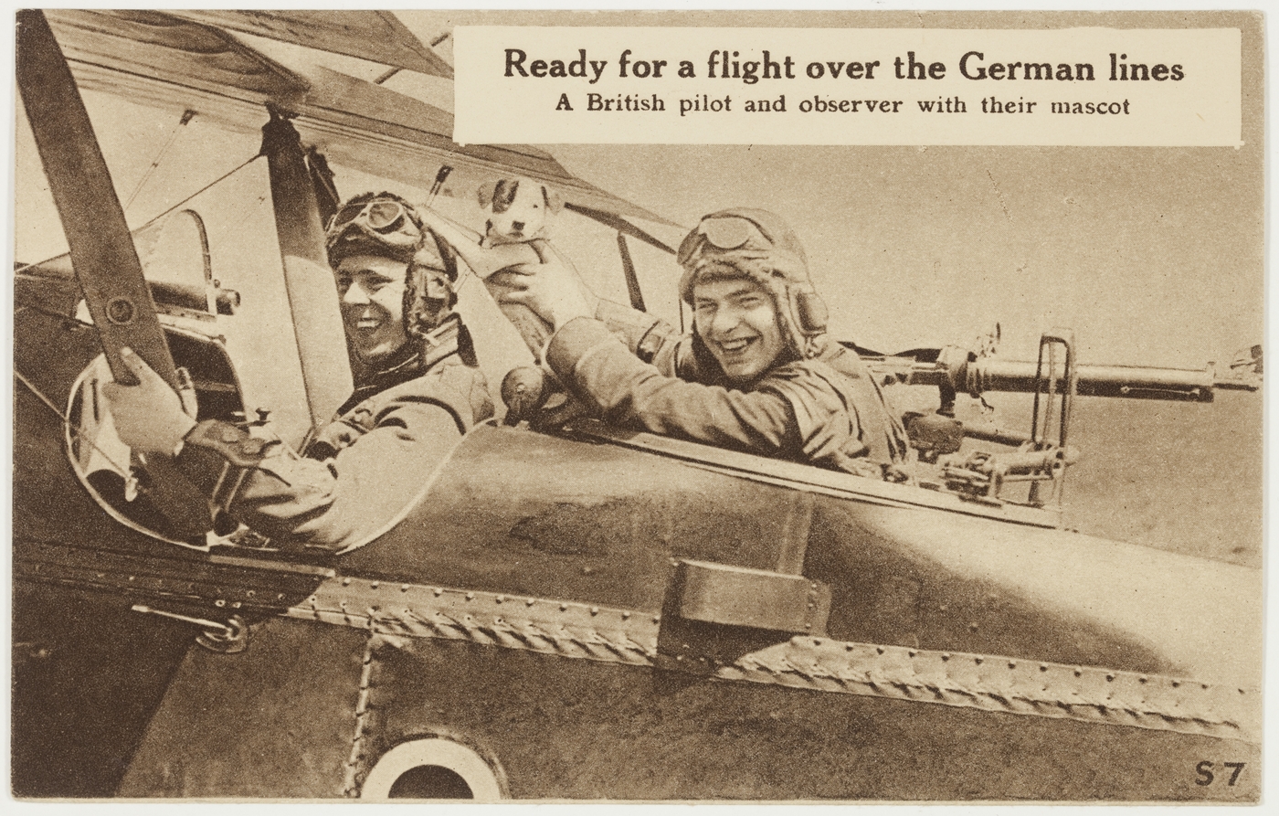 Ready for a flight over the German lines - a British pilot and observer with their mascot 
