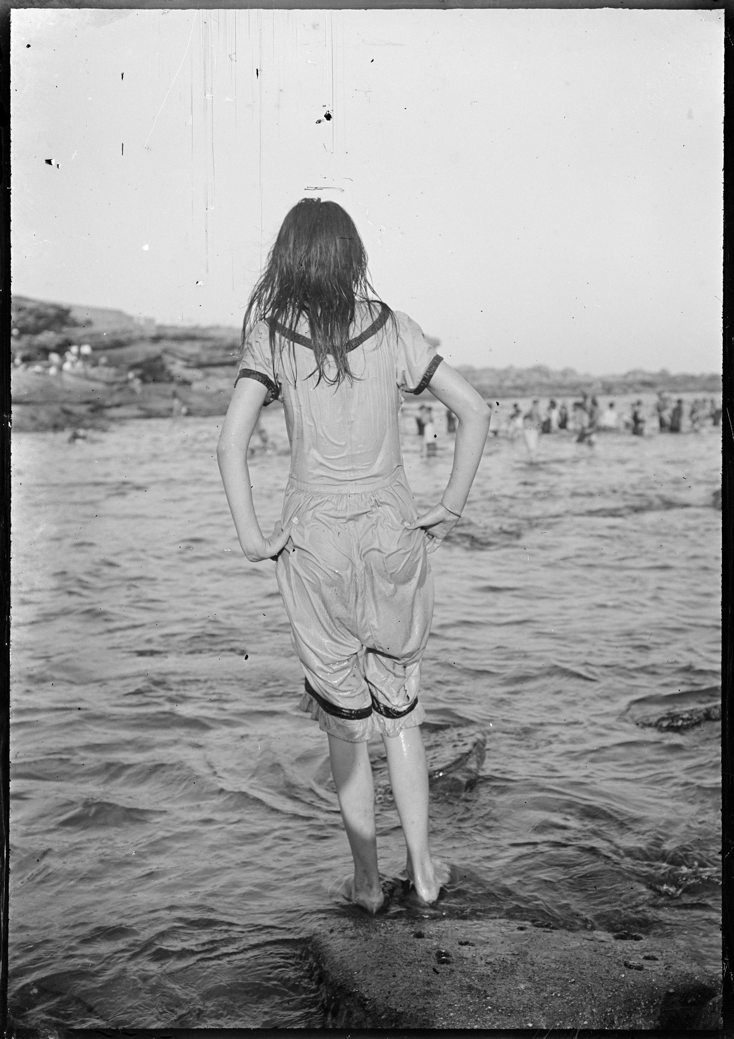 Girl in wet swimsuit at Clovelly