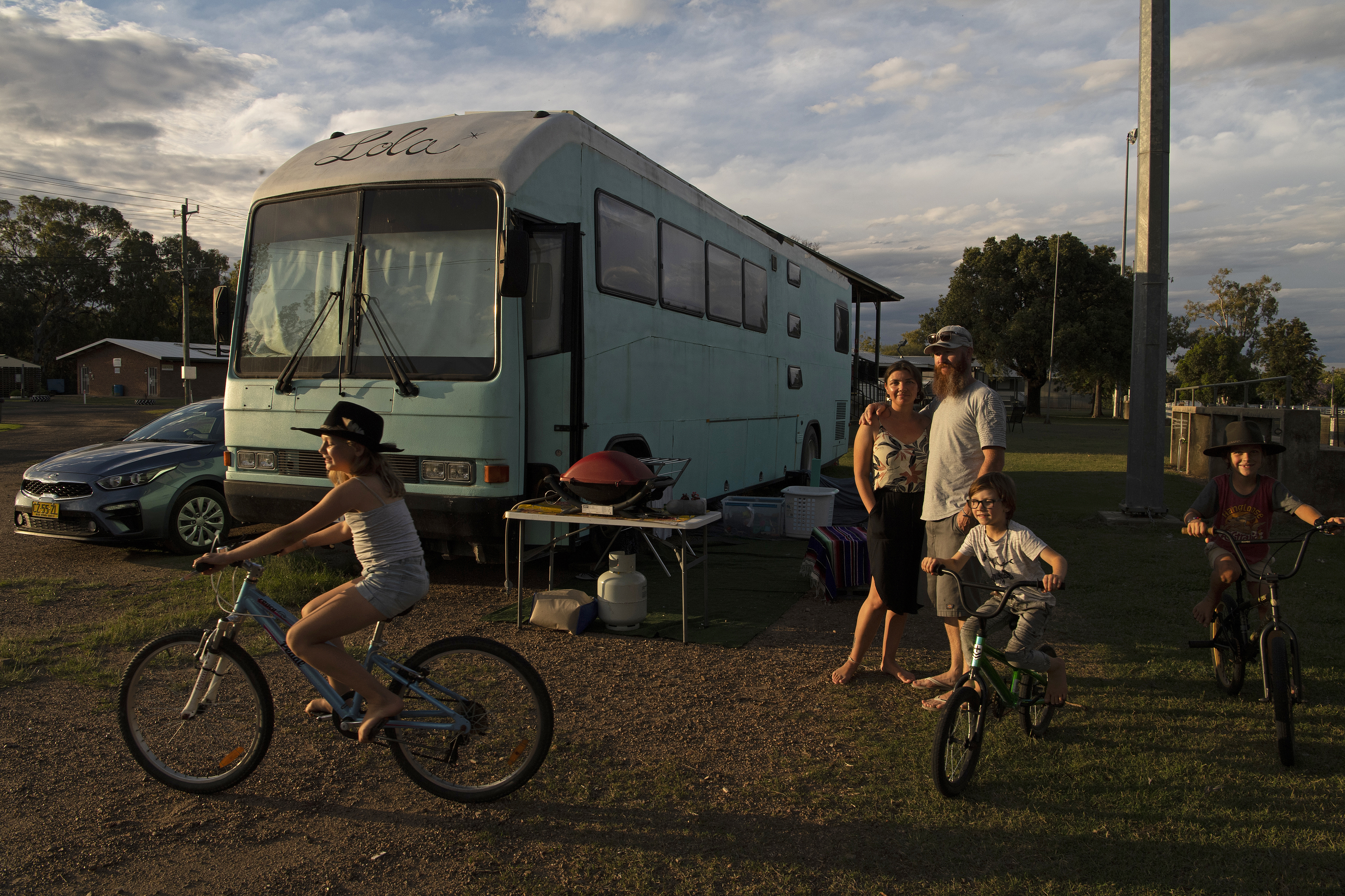 Jason and Sarah Cielo with their children Stella, Rome and Rocco had been living in their bus at Moree showground for three months. Photo by Louise Kennerley