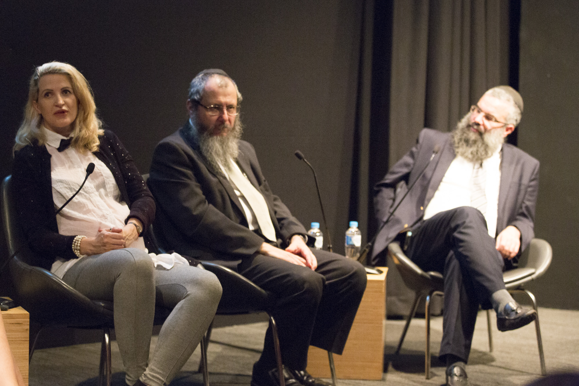Photographer D-Mo Zajac in conversation with Rabbis Gourarie and Slavin, 10 March 2016, photograph by Joy Lai