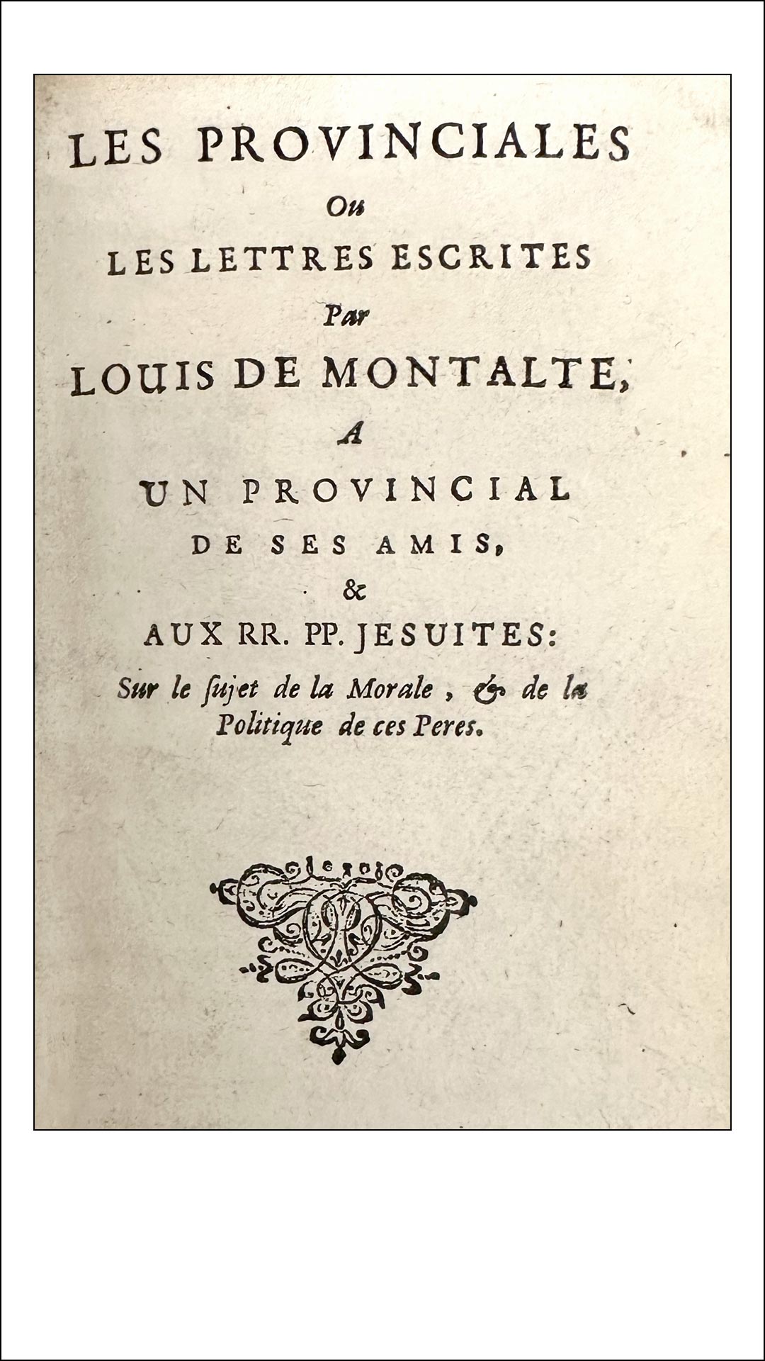 Book inside title page with french text and decorative illustration