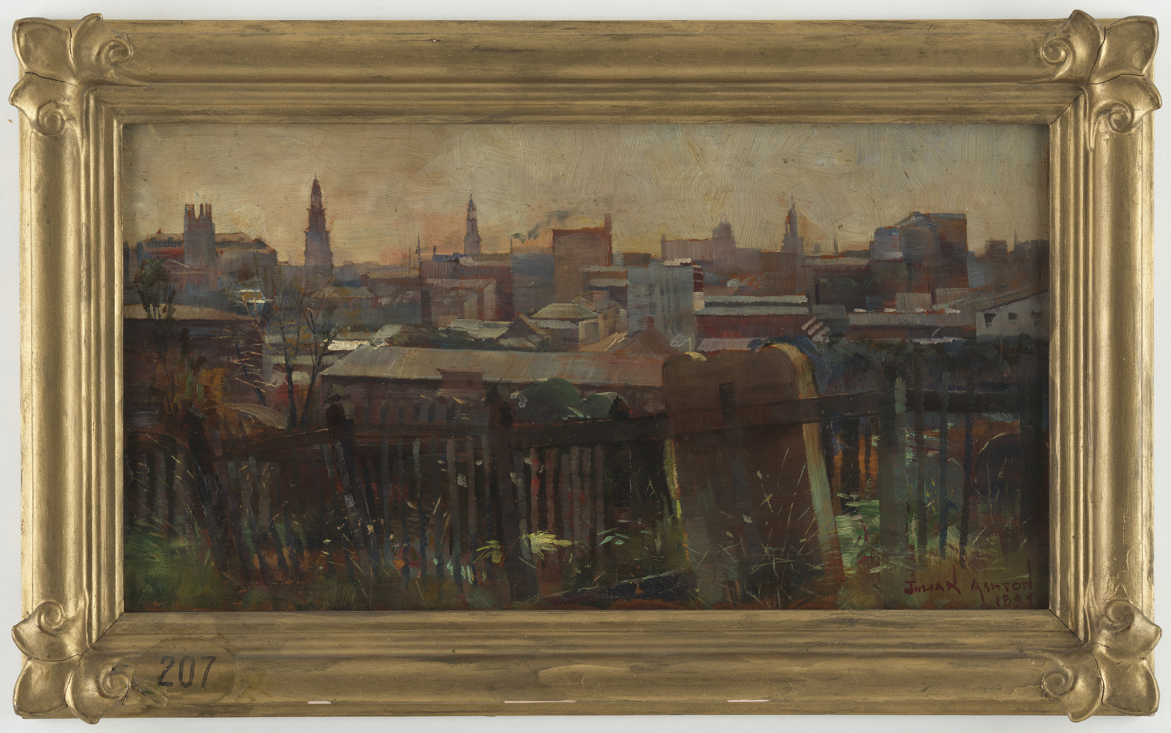 Framed oil painting of gravestones in a cemetery. A city can be seen the background.