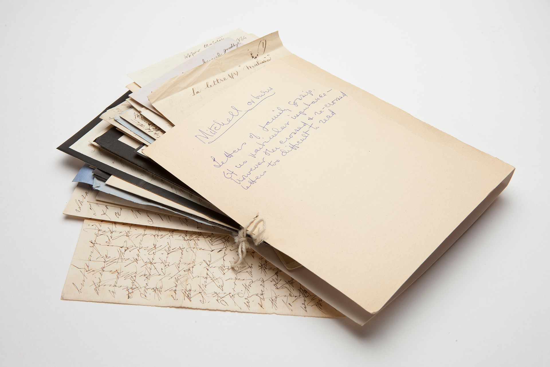 A file folder with several documents within.