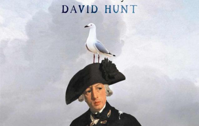 Man standing in water wearing old naval uniform with seagull on his hat on book cover of Girt The Unauthorised History of Australia by David Hunt