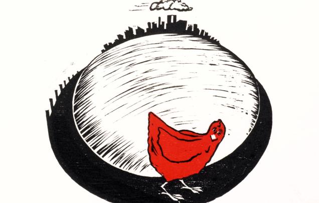 A red hen in a black and white landscape