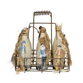 Bottles with painted-on images of men in British naval dress, in a rusty metal carrier
