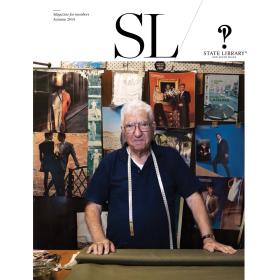 Man standing with measuring tape and roll of cloth layed out on cover of Autumn 2014 New South Wales State Library Magazine