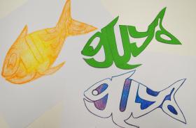 The word guya drawn into the shape of three fish