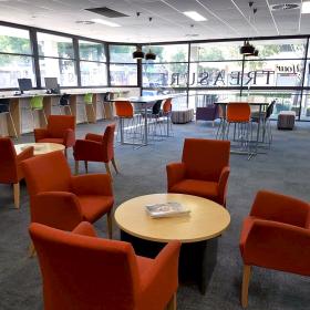 Internal library space with different styles of seating and tables