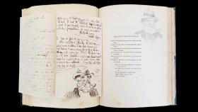 An open poetry book with hand drawings.