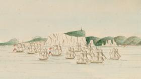Eleven ships sailing in front of a shore with high cliffs