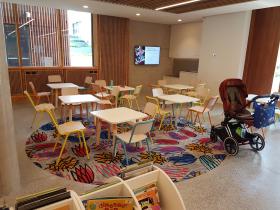 Children's area in library with tables and chairs
