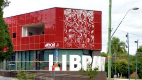 External view of red building with library sign