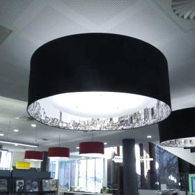 Close-up of lightshades in a library