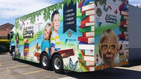 Mobile library truck with pictures of children and books
