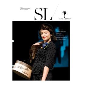 Woman with smiling carrying a carrying a hat box on cover of 2009-2010 New South Wales State Library Magazine