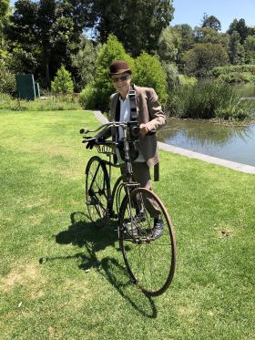 Tony Wheeler in Melbourne with a bicycle and attire from the 1890s, photo supplied