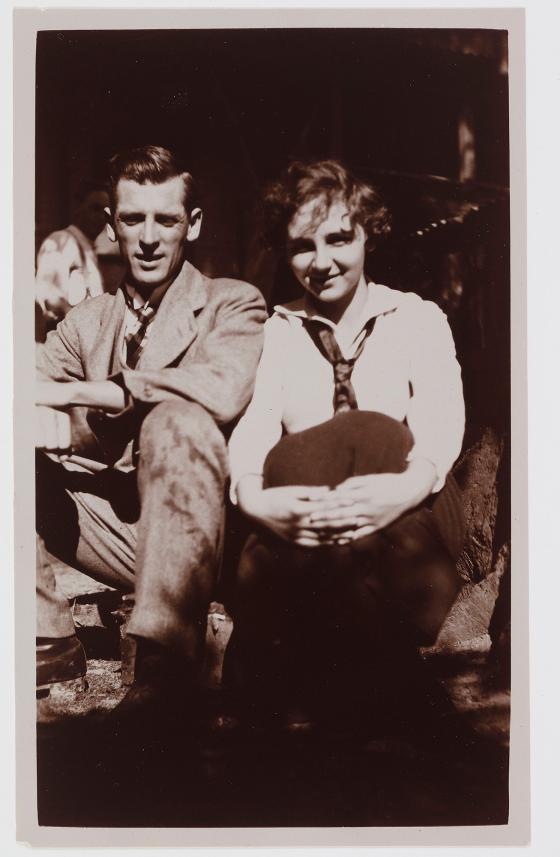 A black and white photograph of a man and a woman.