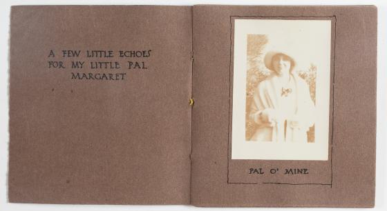 Hand-bound book open to a page with a photograph of a woman.