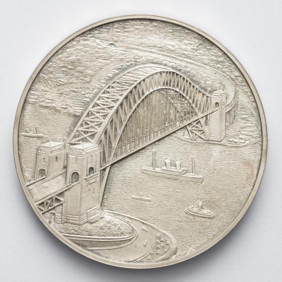 circular medallion with image of sydney harbour bridge